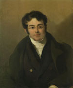 White man with wavy dark hair, sideburns, and glasses and wearing dark coat and vest with white cravat.