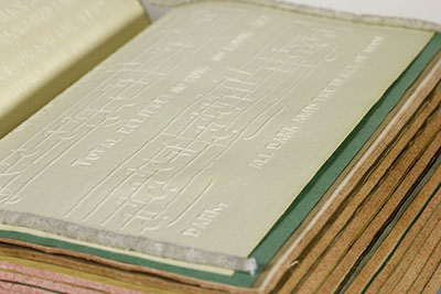 Raised-printed leaf of music in First Annual Report of the Managers of the Pennsylvania Institution for the Instruction of the Blind (Philadelphia, 1834).