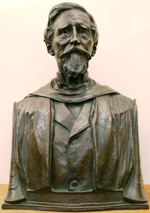 Sculpted bust of white man with mustache and goatee, his gaze pointed upwards. Inscribed: 1825-Henry Charles Lea-1909.