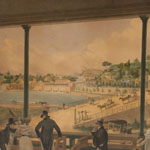 River view seen through porch columns showing busy covered bridge, canal boat, and buildings on opposite river bank at base of mound. Men and women on porch in foreground